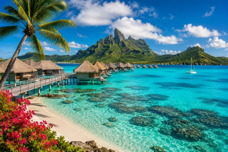 Luxury overwater bungalow and turquoise lagoon representing dream destination vacations